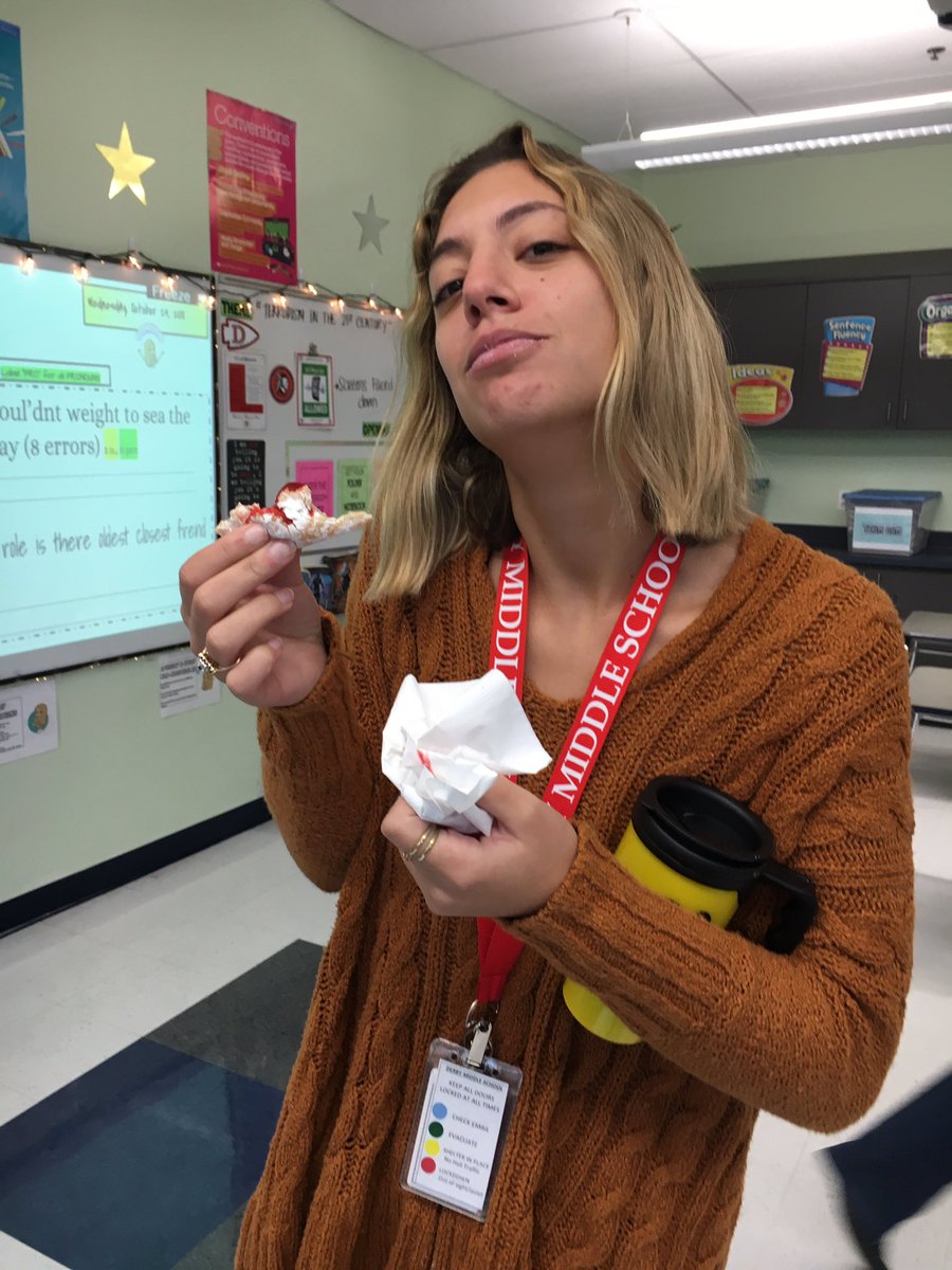 NFMSBand's tweet photo. Happy Wednesday! Our awesome health teacher @tacobout_health  enjoying a delicious powdered jelly donut. #WeAreDMS #DonutGate #TGitsalmostfriday https://t.co/OzDGxu4zKQ