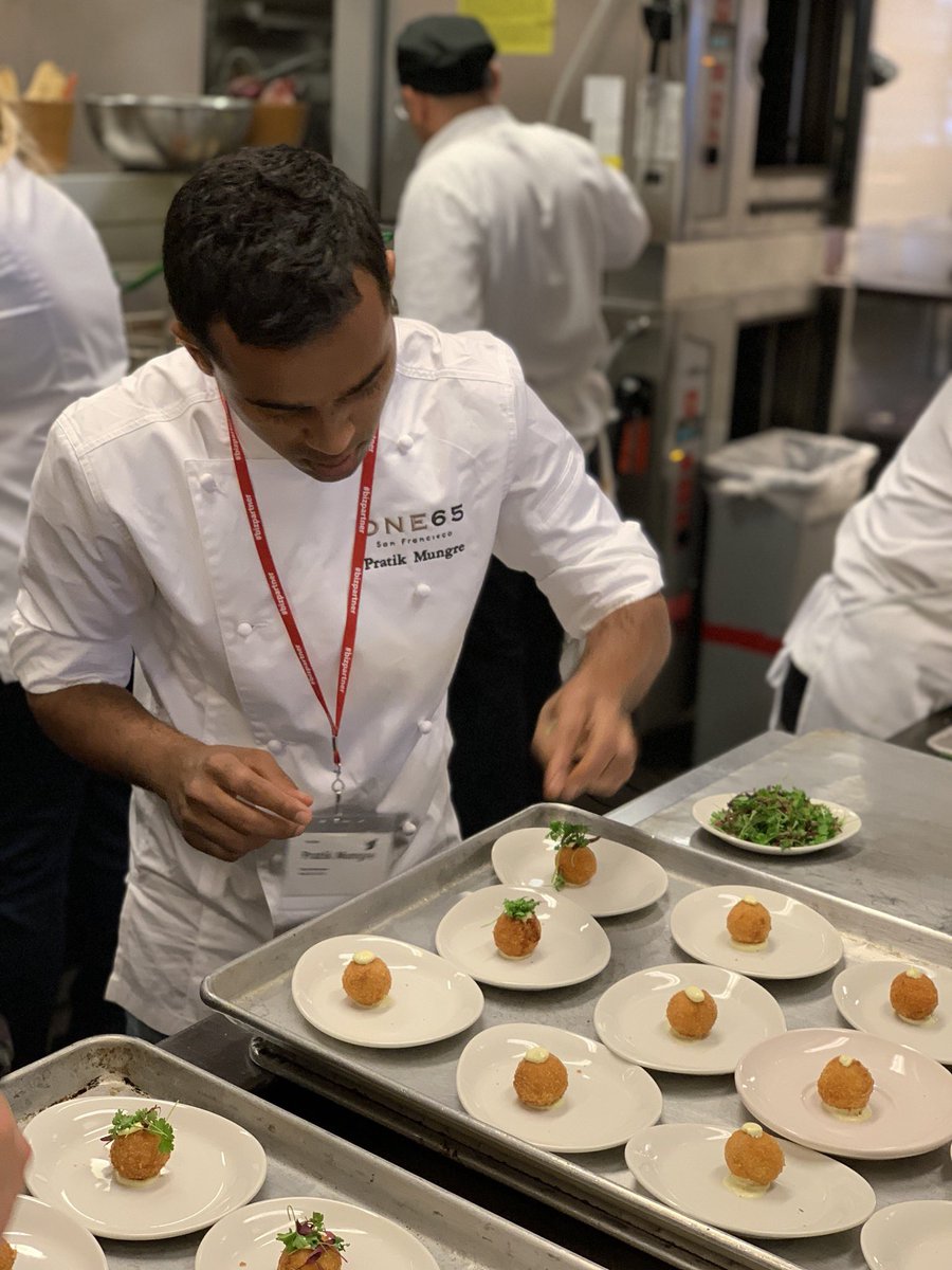 Our Sous Chef Pratik preparing cod brandade croquettes for <a href="/twitter/">Twitter</a> employees! #ONE65takestwitter #guestchefONE65