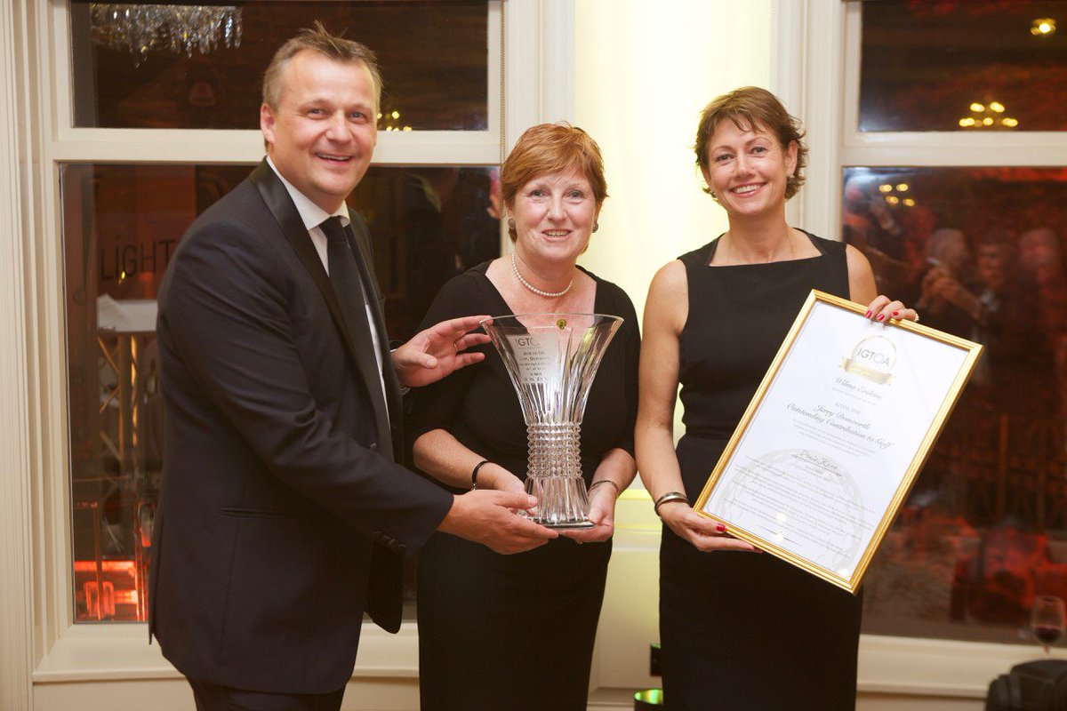 NITouristBoard's tweet photo. Congratulations to Wilma Erskine, Secretary Manager of @royalportrush, who won the Lifetime Achievement Award at the #IGTOA awards this week. A very well-deserved accolade in the build up to #TheOpen in 2019 ⛳️🏆 https://t.co/g90BXMCQs9
