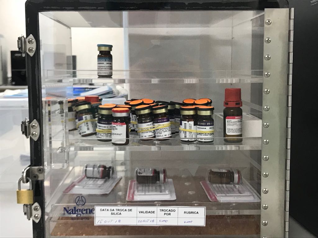 Medicine inside a transparent medicine box.