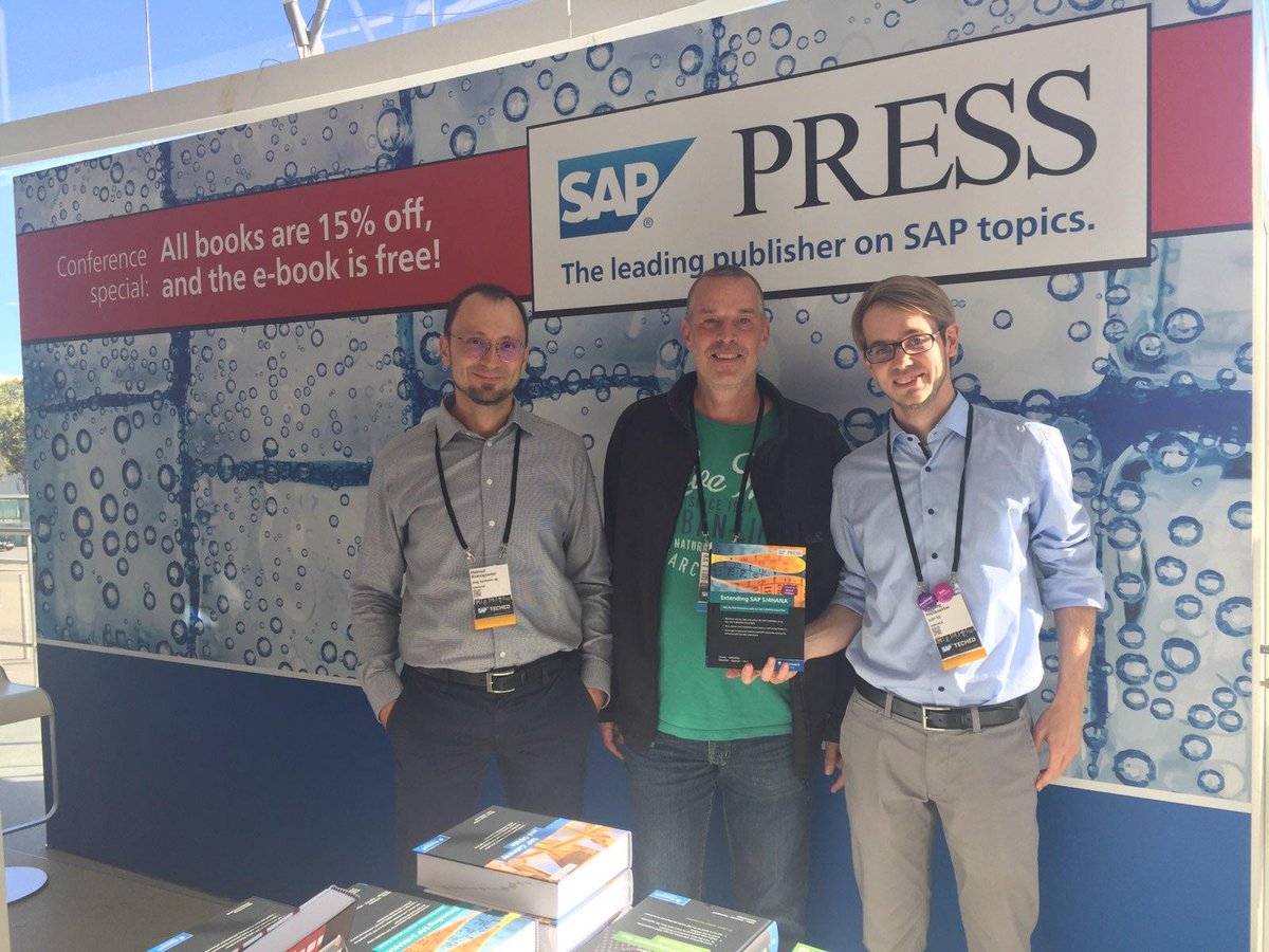 From today at #SAPTechEd: Helmut Königseder, Jürgen Göbl, and Henning Heitkötter, posing with their book on extending SAP S/4HANA.