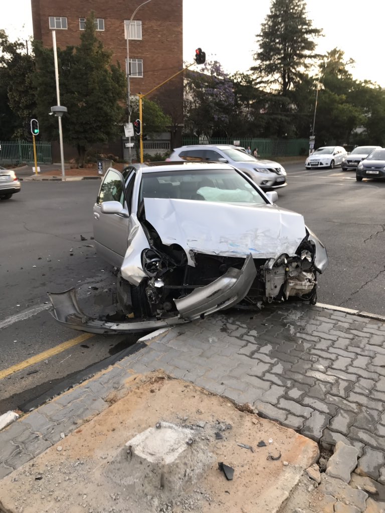 josh_lasker's tweet photo. @MandyWiener @JMPDSafety this taxi just jumped a red robot full of passengers and crashed into the Wanderers Golf Club. The taxi driver fled the scene. https://t.co/GWsQPrT8y3