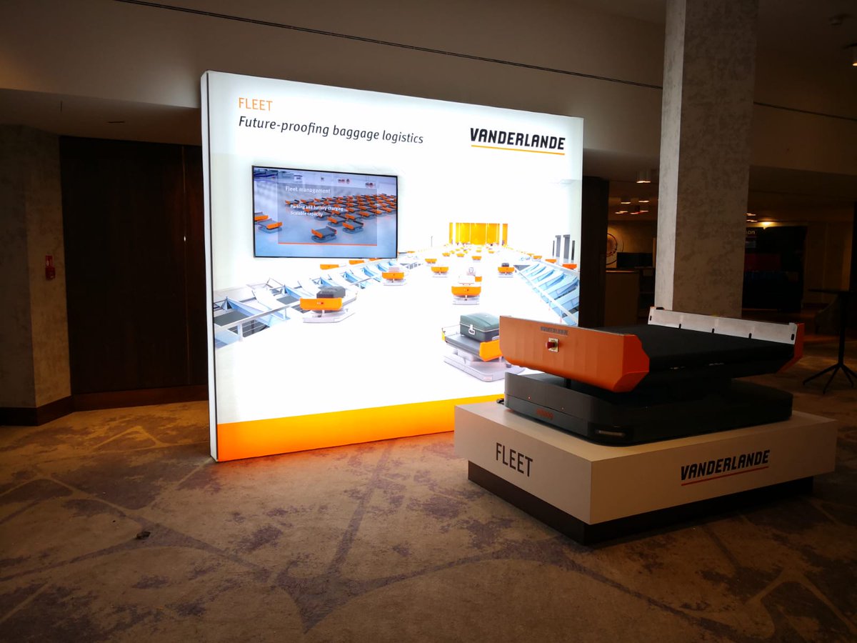 Vanderlande's tweet photo. The #AAI2018 Conference 2018 is a wrap! We welcomed event delegates to the Vanderlande stand and yesterday, a speech was given by Mike Christman (#Vanderlande) and Andy Garner (#Heathrow) about disruptive innovation. (photo credit: @Aztec_UK ) #baggage #airports @Aviationevents1 https://t.co/ay63cqu4K4