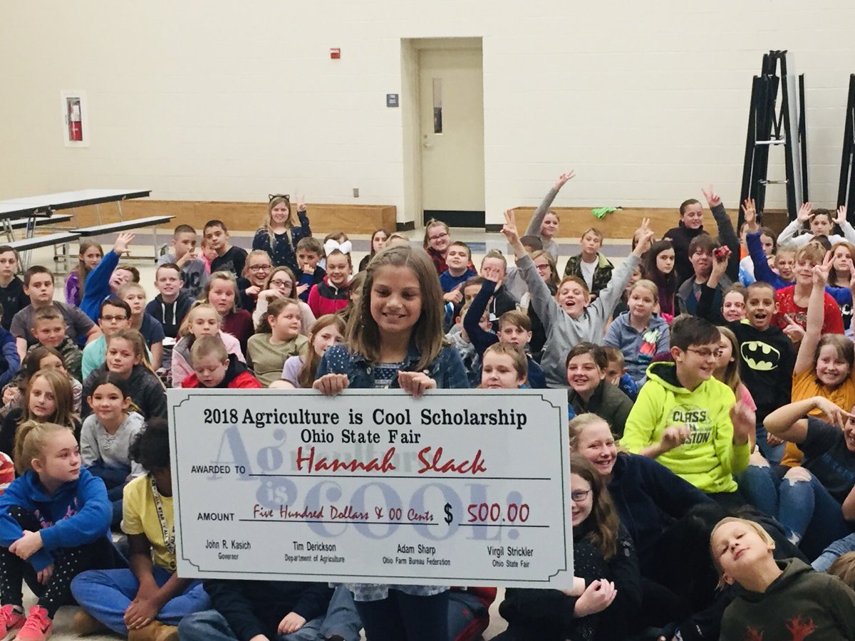 OhioStateFair's tweet photo. The #AgIsCool Prize Patrol from the Fair, @OhioDeptofAg &amp; @OhioFarmBureau spent the morning at @MaysvilleSchool recognizing Hannah for her great essay about what makes ag cool. She isn’t sure where the giant check is going to go, though. #wallart #giantcheck 💵 https://t.co/clmPLwJDYo