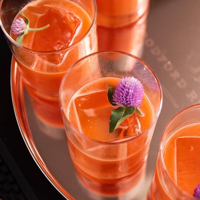 It’s 5pm somewhere! The 24 Carrot Magic Cocktail with <a href="/woodfordreserve/">Woodford Reserve</a>, Carrot, Lemon, Ginger-Honey, Sugar, and Flowers created by <a href="/chrisamiam/">Chris Amirault</a> was a big hit at our events a few weeks back!