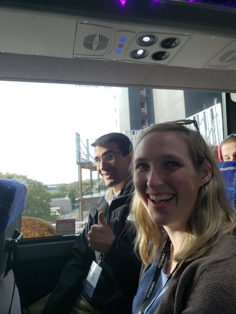 FluhrerReed's tweet photo. Engineer Michael McDonald poses in front of his project Two Glenwood/Origin Hotel with Engineer Kim Mott on the #naiopbustour2018 to start the day https://t.co/nLZhidQUly
