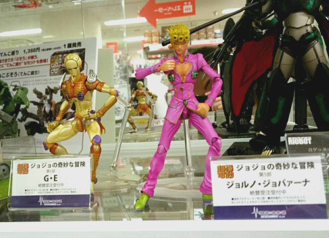 メディコス エンタテインメント ジョジョ 展示情報 本日より超像可動 ジョジョの奇妙な冒険 第5部 より主人公 ジョルノ ジョバーナ とスタンド G E の展示を あみあみ秋葉原ラジオ会館店 様にて開始いたしました お立ち寄りの際は是非ご覧
