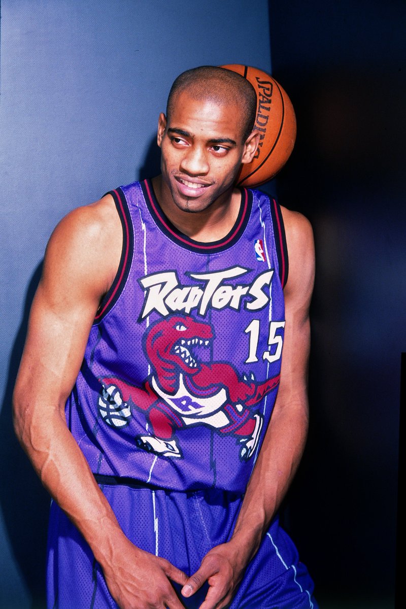 purple and red raptors jersey