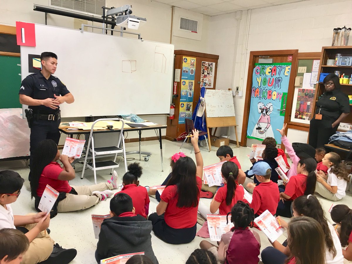 DPDCA's tweet photo. It’s #RedRibonWeek and today is #HatDay! Senior Corporal Vu and Community Outreach Rep. Foster are describing the difference befween abuse and discipline.
#ThursdayThoughts #ServiceFirst https://t.co/ccgrU2yXAh