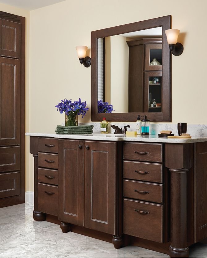 mc_cabinetry's tweet photo. High design isn't just for the kitchen.  This Allen door style vanity in Oak with Slate Black Glaze finish wishes it could admire itself in the mirror. #midcontinentcabinetry https://t.co/GiQ5AIuKpF