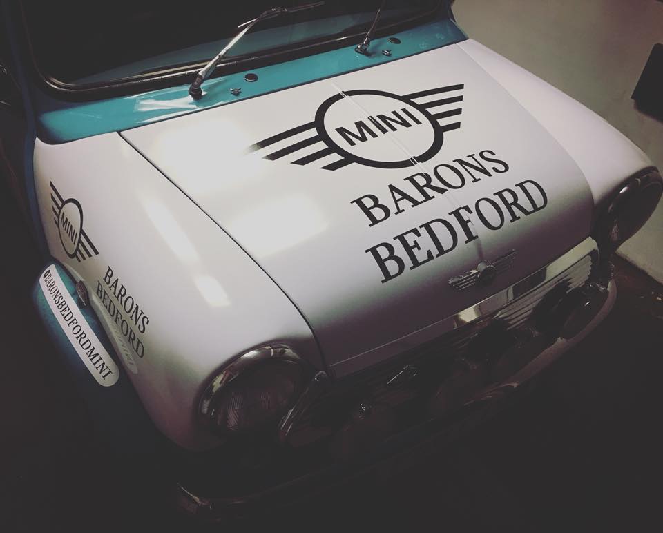 Group1Auto's tweet photo. Hats off to Matt Wood, Brand Manager at @Bedford_MINI, and his partner Joanne for entering The Italian Job rally benefiting @ButtleUK! We love the Barons-themed livery on your classic MINI and wish you the best on your journey! #buttleuk #italianjob #mini #group1auto #group1cares https://t.co/34InB8Ozmq