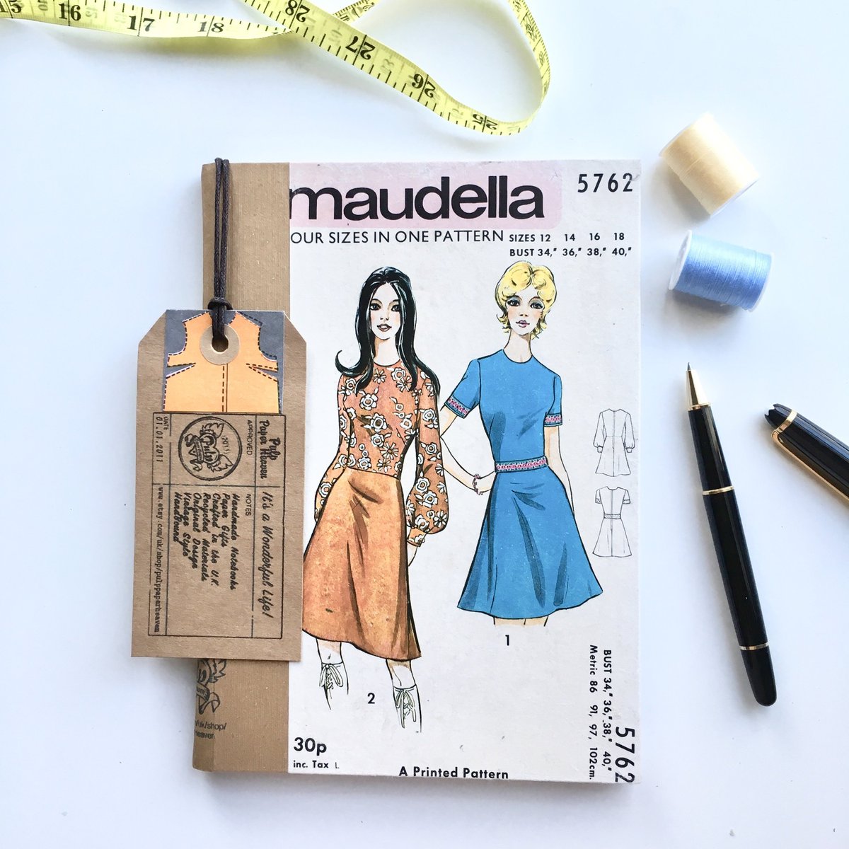 I'm adding fresh from the press notebooks to my Etsy shop etsy.me/2SiHvau like this SEWING PATTERN NOTEBOOK that reuses a vintage Maudella pattern #booksandzines #journal #birthday #christmas #dressmakersnotebook #vintageclothing #fashion #sewinggift