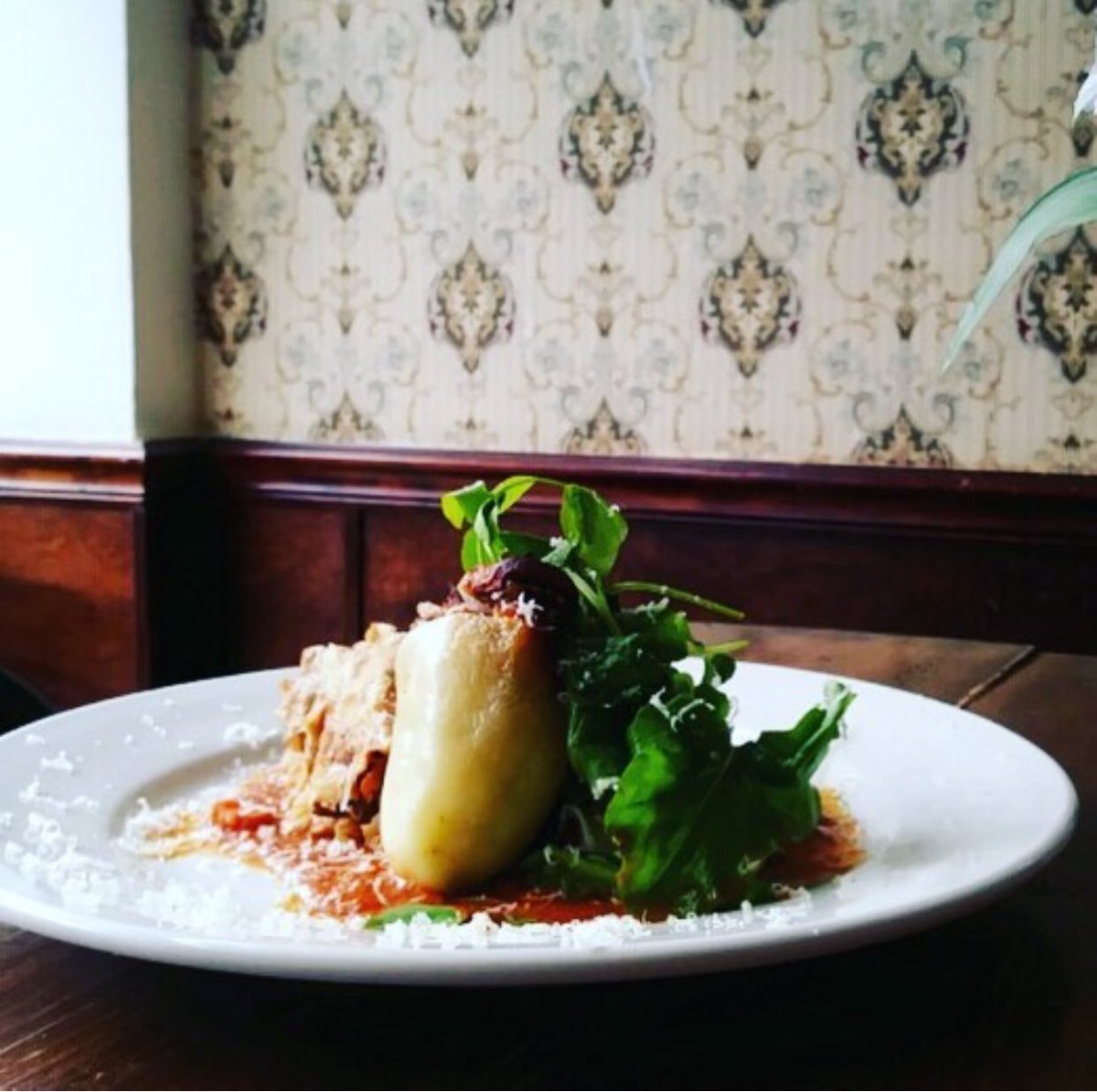 Tonight’s VEGTARIAN SPECIAL is a layered mushroom pie with lentil stuffed peppers, @laurelbranchgardens fresh picked arugula and peashoot salad toppedwith @ashe_county_cheese grated Romano!!