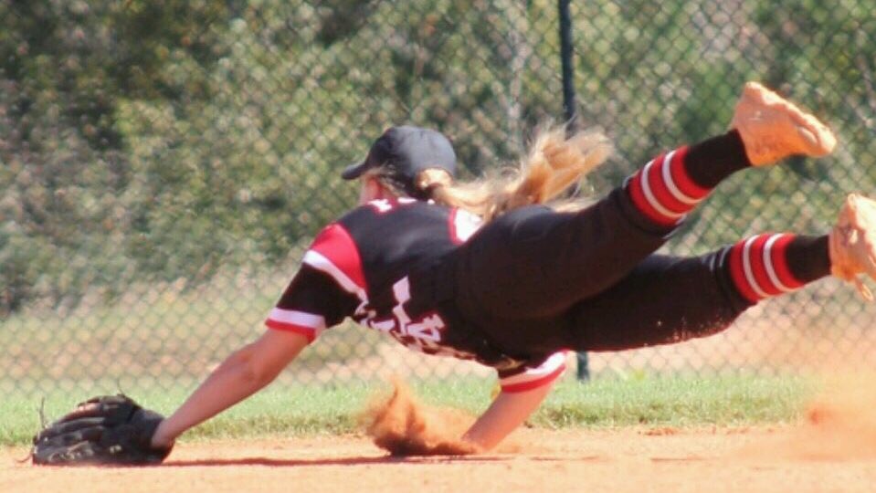 GHSA WINNER: Britney Foster lays out for a ground ball as her Marion County Lady Eagles advance to play @ 7pm tonight vs Gordon Lee in Columbus!