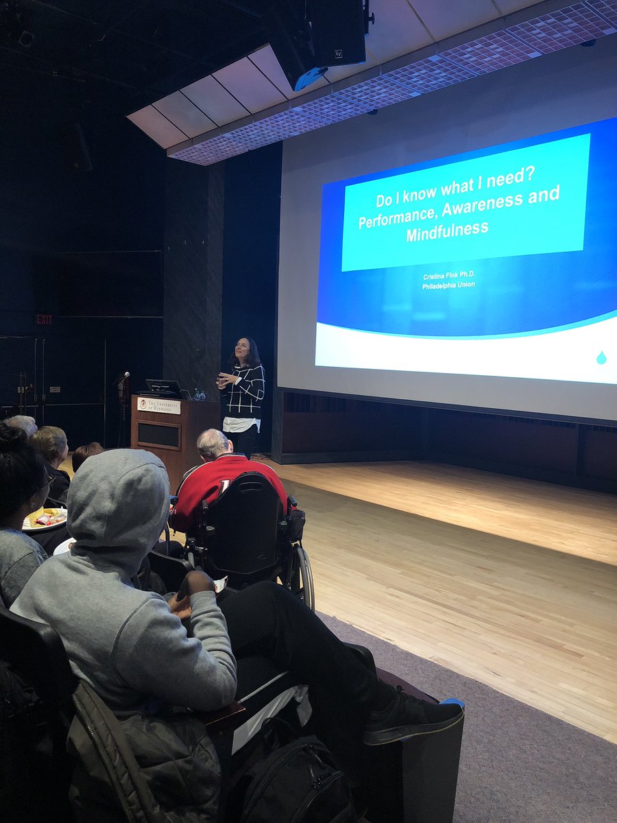 cscmanitoba's tweet photo. Dr. Cristina Fink two time Olympic athlete presenting at #CBLecture @uwinnipeg #mindfulness is about being in the moment. It is not meditation. https://t.co/ruB6rPeoRI