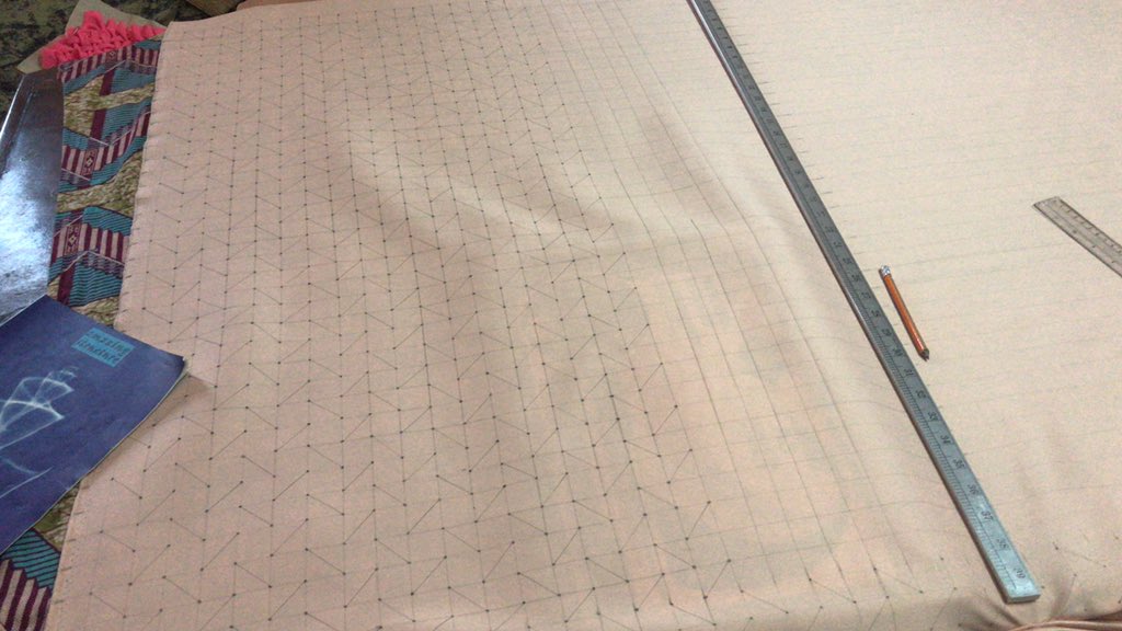 metakay's tweet photo. CANADIAN LATTICE SMOCKING which gives an illusion of a woven fabric. I drew over 1000 squares measuring 1” and sewing each square by hand. I found so much joy doing it. #hautecouture #fashiondesign #fashiondesigner #fashion #design #designer https://t.co/ivA62ryoJi