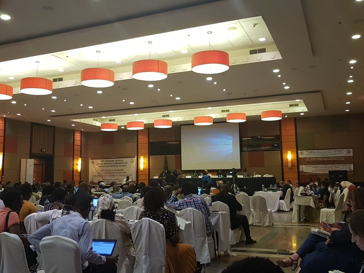 ACHPRreport's tweet photo. At #ACHPR63 panel on Human rights defenders and resolution 68/91 Achievements and Way forward.
Commissioner Lumbu is speaking on the efforts of the commission on the protection of Human rights.
#ACHPR63 #ACHPRupdates https://t.co/A1KD3x71Hp