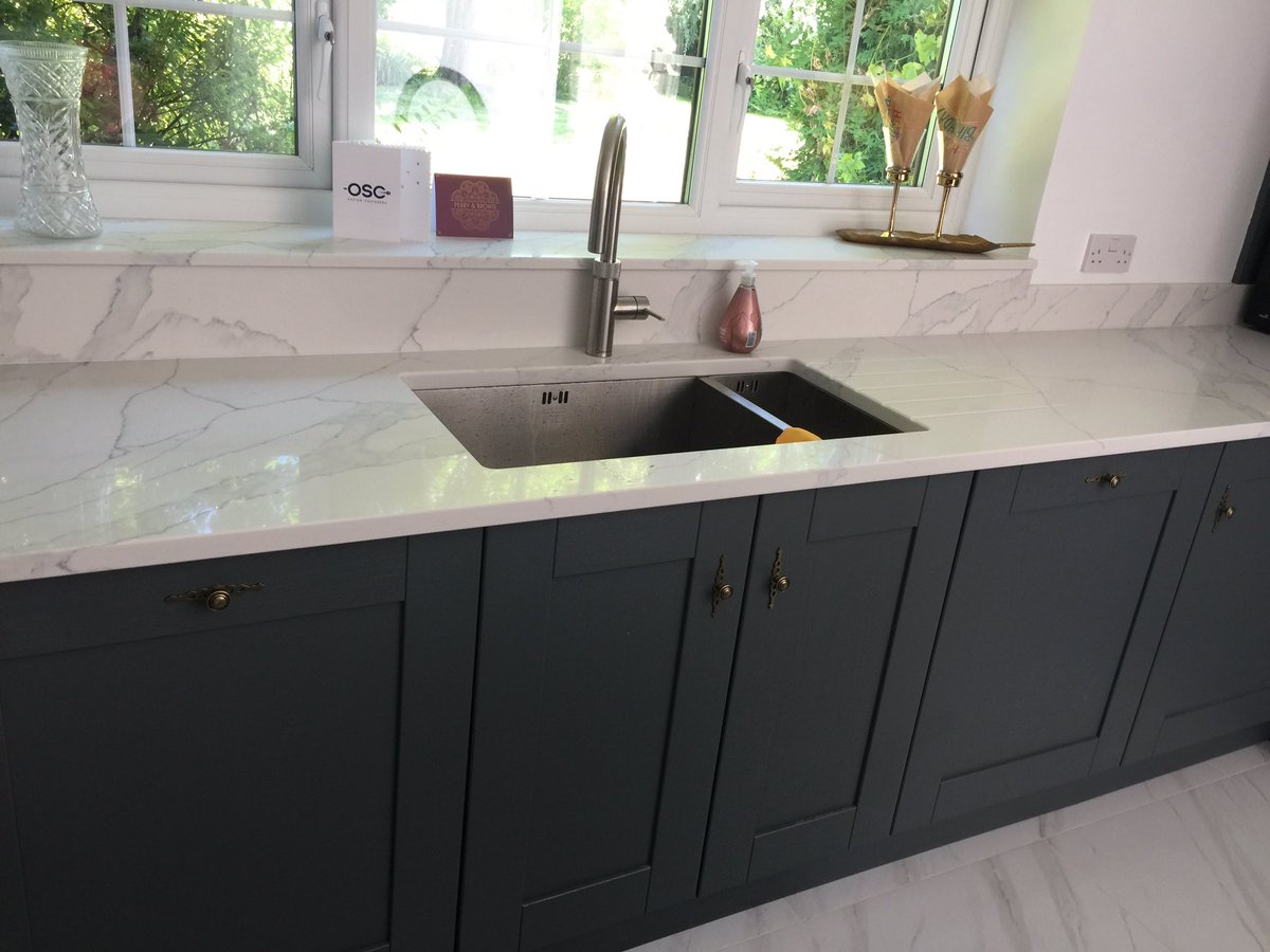 We are so pleased with this completed kitchen. Madison painted Gun Metal kitchen and Madison painted Marine island #shakerkitchen @Kitchen_Stori , @BoschHomeUK appliances, @quooker flex tap,quartz worktops,finished with antique brass handles #kitchendesign #kitcheninstallation