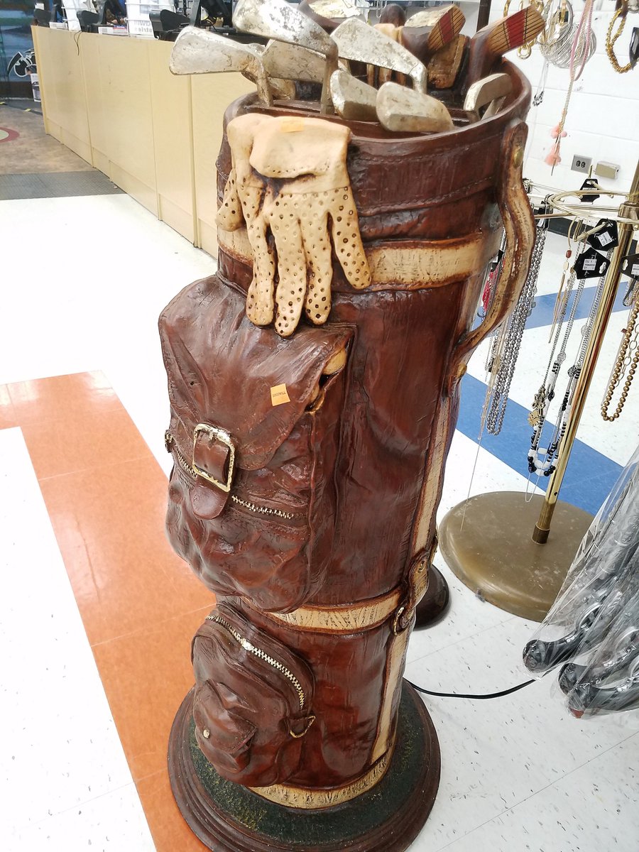 TriadGoodwill's tweet photo. You never know what you'll find when you shop at Triad Goodwill! We found this golf bag statue recently at our 1235 South Eugene Street, Greensboro store. It's the perfect gift for the golf lover in your life. #TriadGoodwillFinds #GoodwillFinds #ThriftStoreFinds #golf #sports https://t.co/qTNVwEl0xb