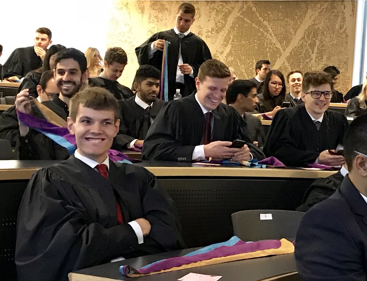 LaurierAlumni's tweet photo. Behind the scenes at convocation. Yes, there is a class on how to carry your hood on stage. On your right hand, loop facing out! The hooder will take it from there. #Laurier2018 https://t.co/wN22C0uaOp