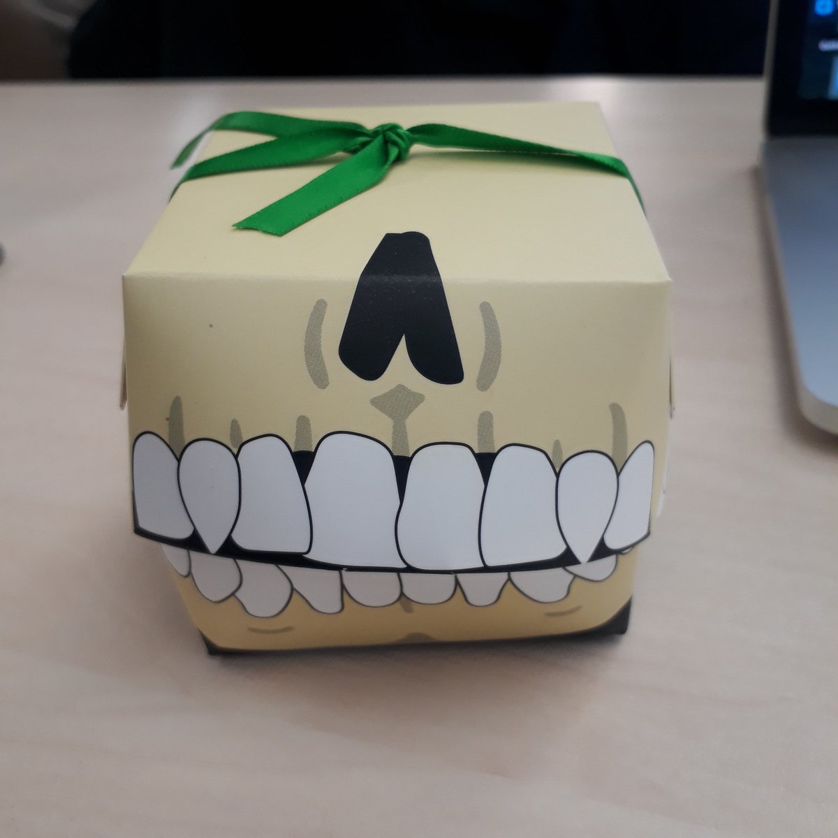 IGAPostgrads's tweet image. As we entered the room, we found little skull boxes on the tables with Halloween-y treats inside! 🖤💀 Look! 
(There was also a chocolate eye... but I ate it before I remembered to take a picture.)
#stirlinggothic