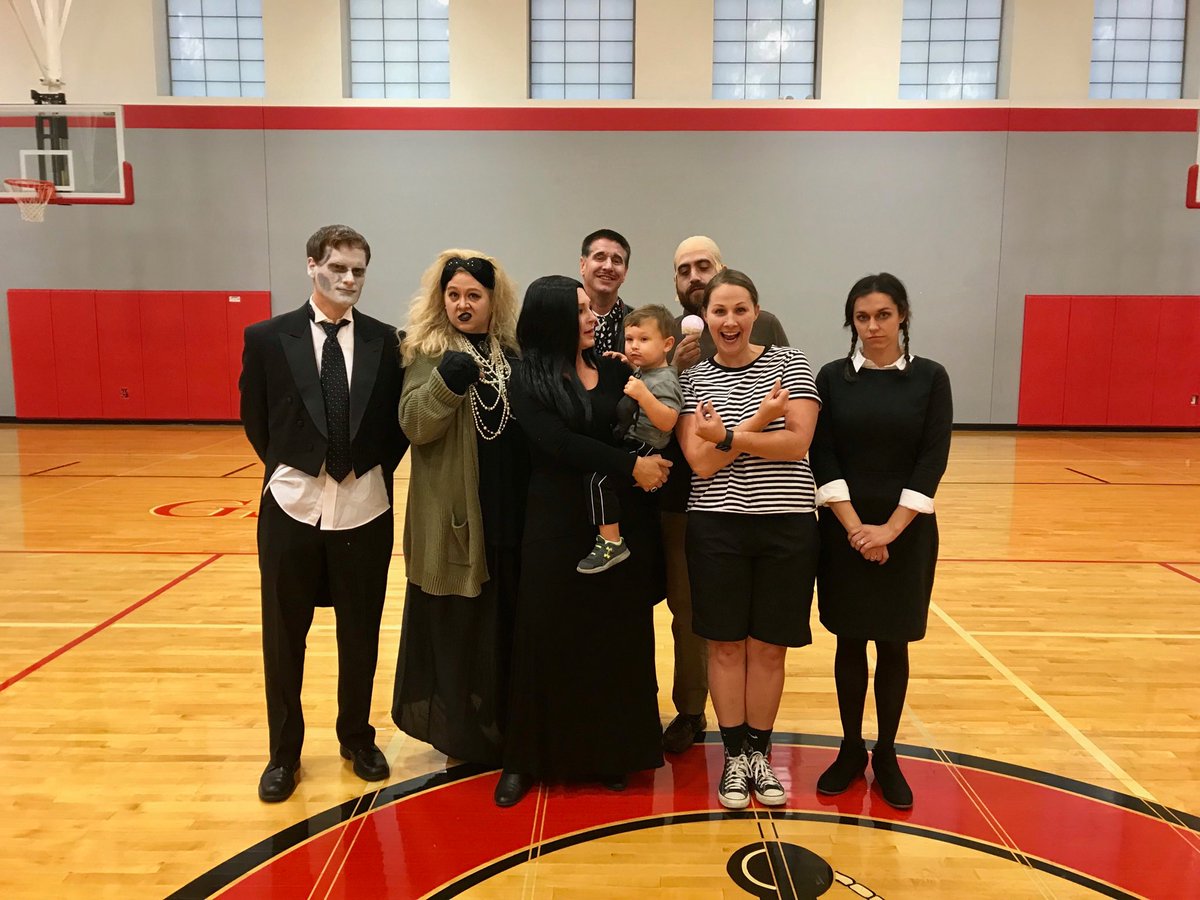 GSLMiddleSchool's tweet photo. Getting a jump start on Halloween...The Addams Family wins the GSL Faculty costume contest. https://t.co/qDtzBIFect