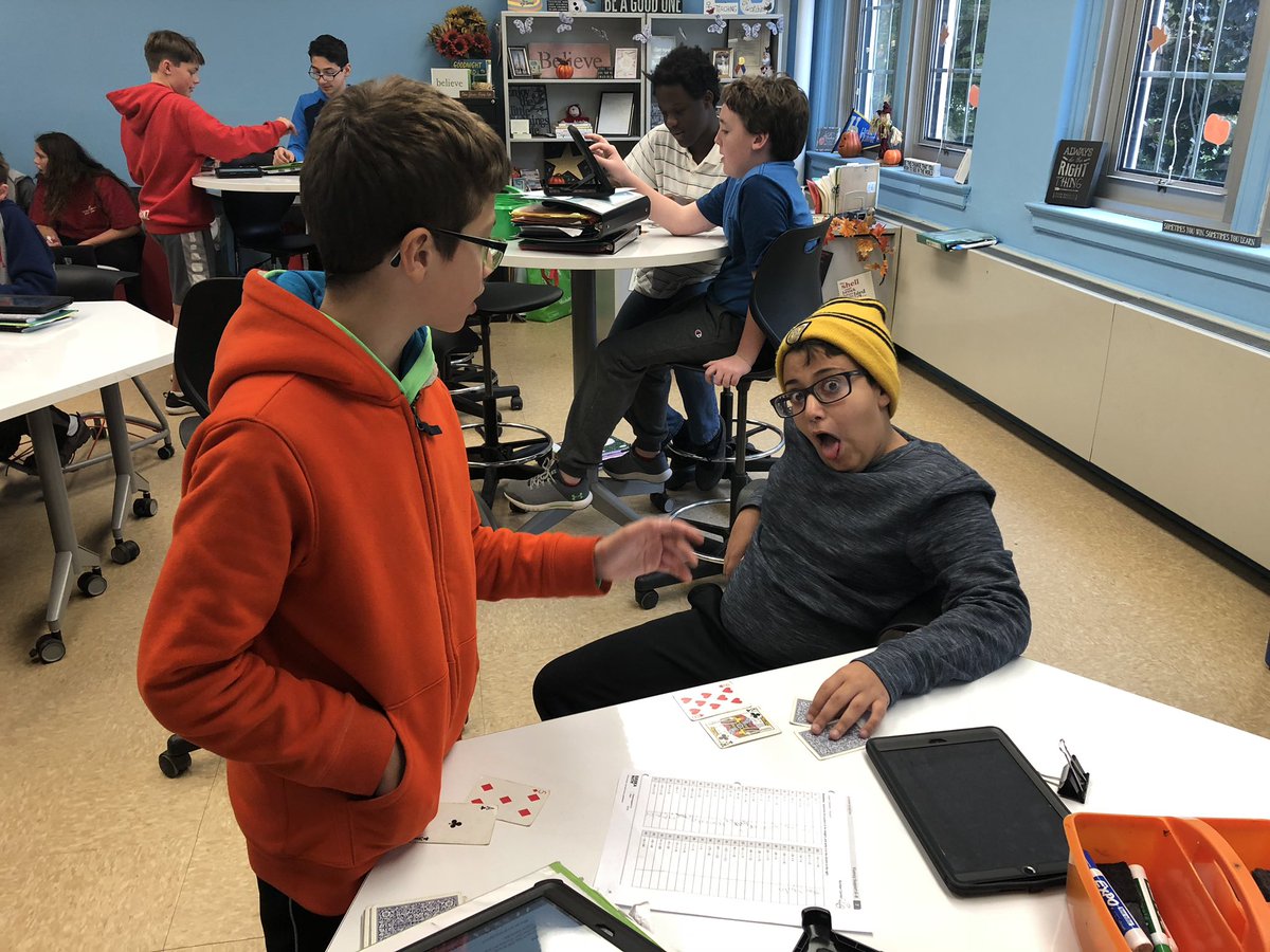 MrsBorges_Teach's tweet photo. Happy #MMSPride from Period 4! Having fun in math class! #MathISfun #IntegerWar #MineolaProud ❤️🖤 https://t.co/ccoyOEY8wA