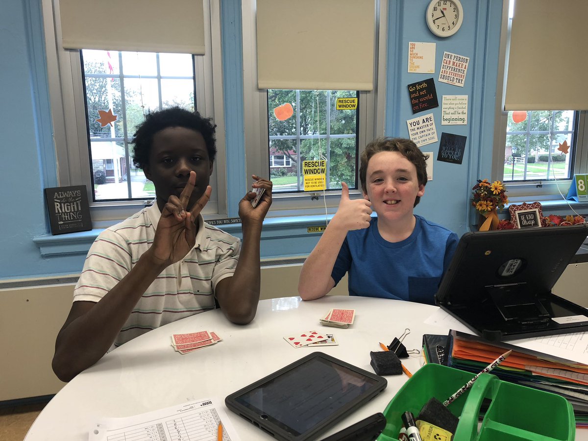 MrsBorges_Teach's tweet photo. Happy #MMSPride from Period 4! Having fun in math class! #MathISfun #IntegerWar #MineolaProud ❤️🖤 https://t.co/ccoyOEY8wA