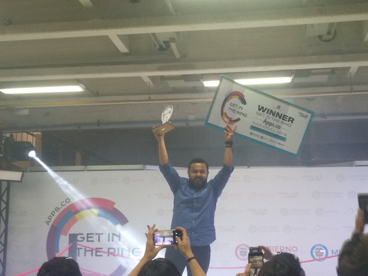 AppsCo's tweet photo. Nuestro director @ivancastanop anuncia como ganador de #GetInTheRingAppsCo a @EmobiColombia. Felicidades https://t.co/0ObAeLnLDE