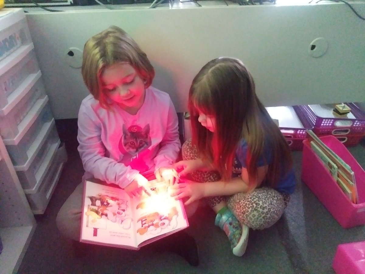Flashlight Friday was a big hit today! We used finger flashlights while reading to our buddies in the dark.