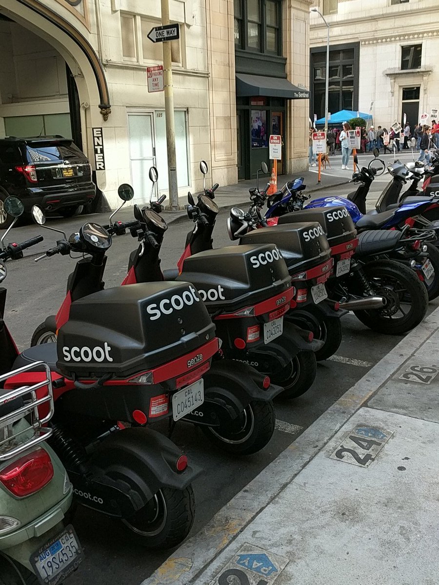 CurbNinja's tweet photo. Scoot bikes taking up 4 spots in #SanFrancisco, not cool https://t.co/pwUJTmRKt3