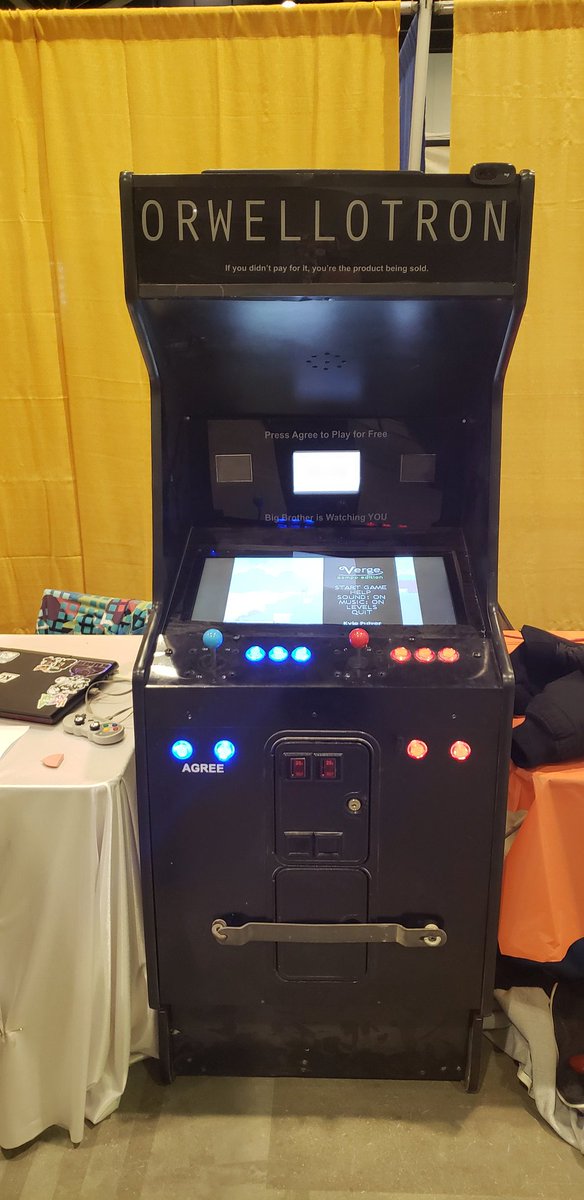 CMDannCA's tweet photo. The #orwellotron #winnitron is set up at #C4comiccon this weekend. You can find the live stream here: https://t.co/C1Z8Bfzwpf

#arcade #indie #comicCon https://t.co/Z4w23VL08U