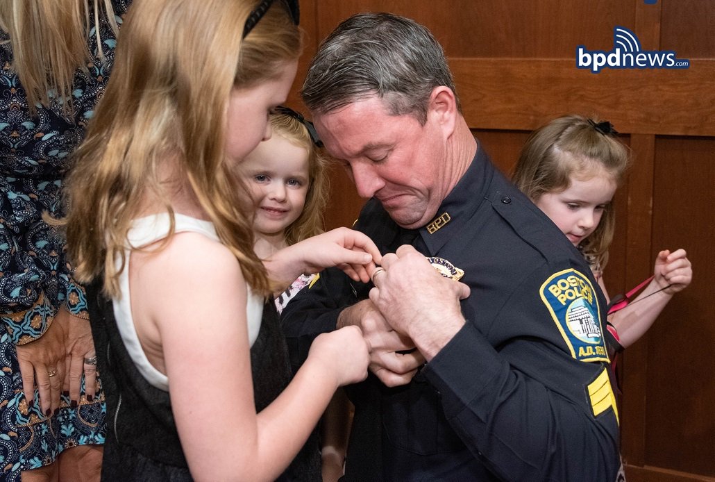 bostonpolice's tweet photo. #RecentPromotions: As we celebrate the promotion of our new sergeants, we ask that you kindly remember that behind every badge is a son or daughter who couldnβt be prouder of their mom or dad. https://t.co/19Jsjq8iLX