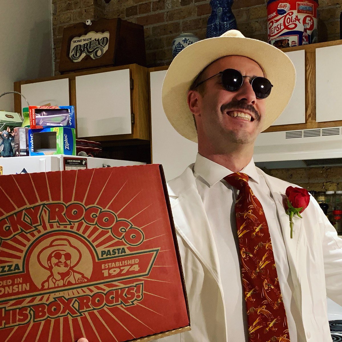 andrewbernier's tweet photo. Rocky Rococo was a great choice for a Halloween costume this year! It all came together nicely. Plus, my pizza prop was delicious! @rockyrococo #pizzamascot #halloweencostume #rockyrococo #pizza https://t.co/JCWfqpKweD