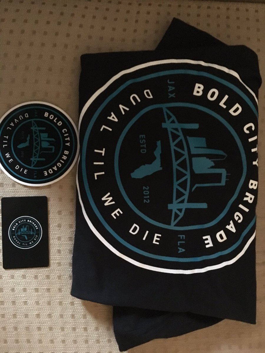 Tronulas's tweet image. Finally here and just in time for Wembley. Took 6 weeks and a customs charge &amp;amp;VAT of £35. Is that right? Even though its technically a gift. @BCB_UK @BoldCityBrigade @DownbytheBank any way live the T-shirt.