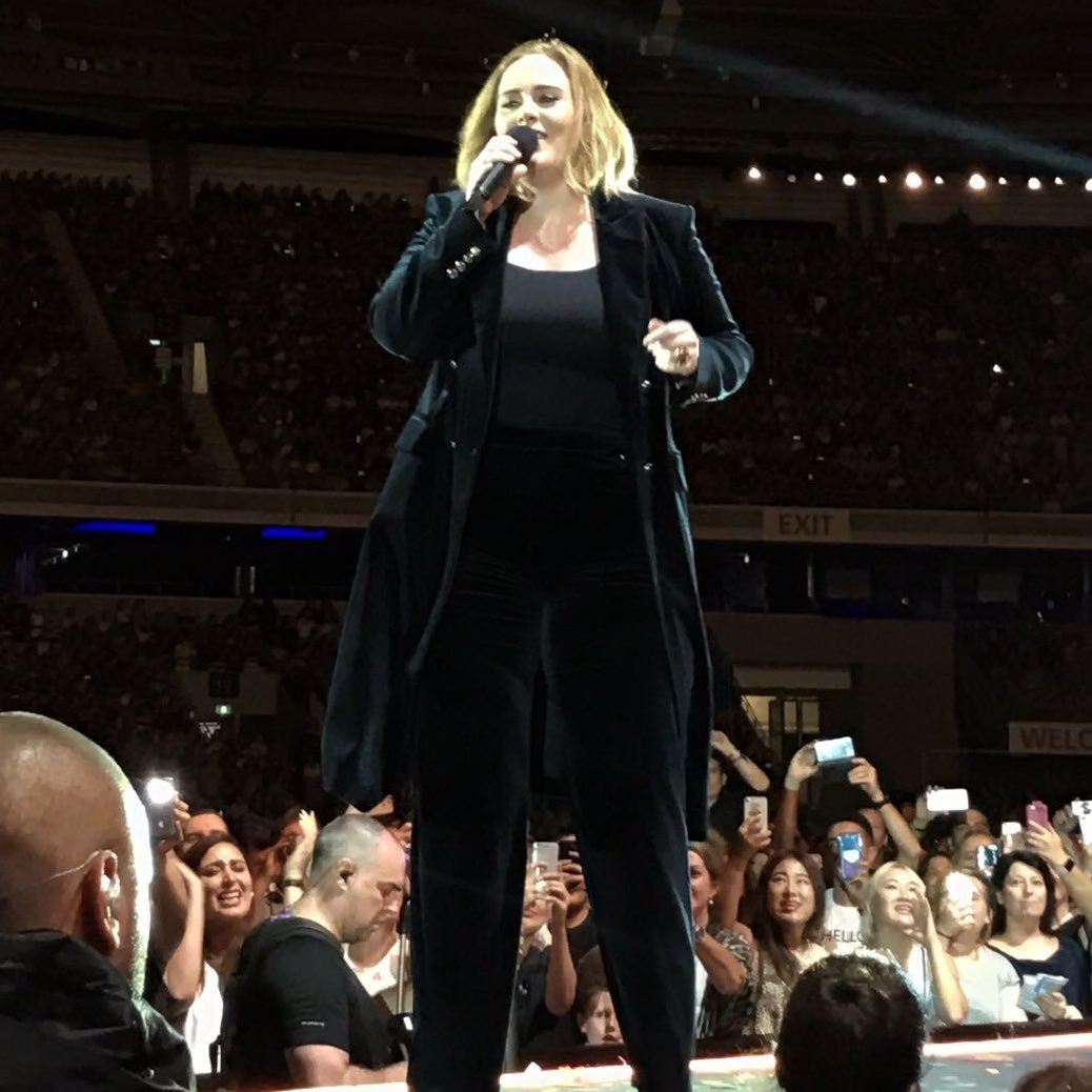 adeleactivities's tweet image. Adele wearing a black velvet pantsuit