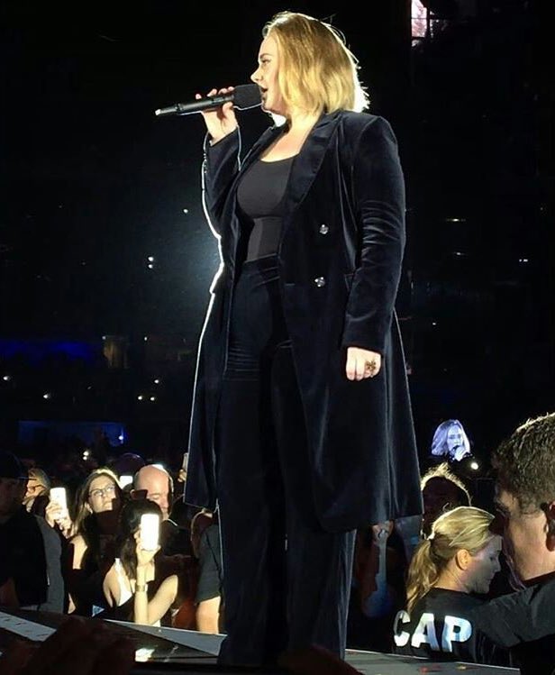 adeleactivities's tweet image. Adele wearing a black velvet pantsuit