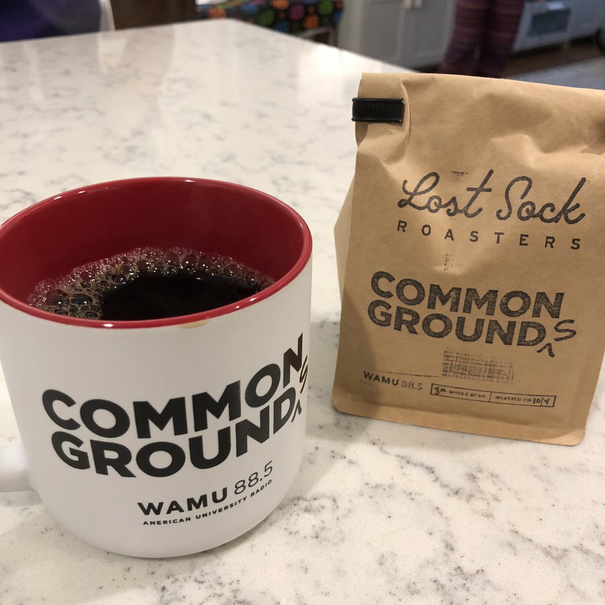 Enjoying my @LostSockCoffee coffee courtesy of <a href="/wamu885/">WAMU 88.5</a> on a rainy morning.  (Thank you to my wife also for the bday present - a  donation to WAMU.)