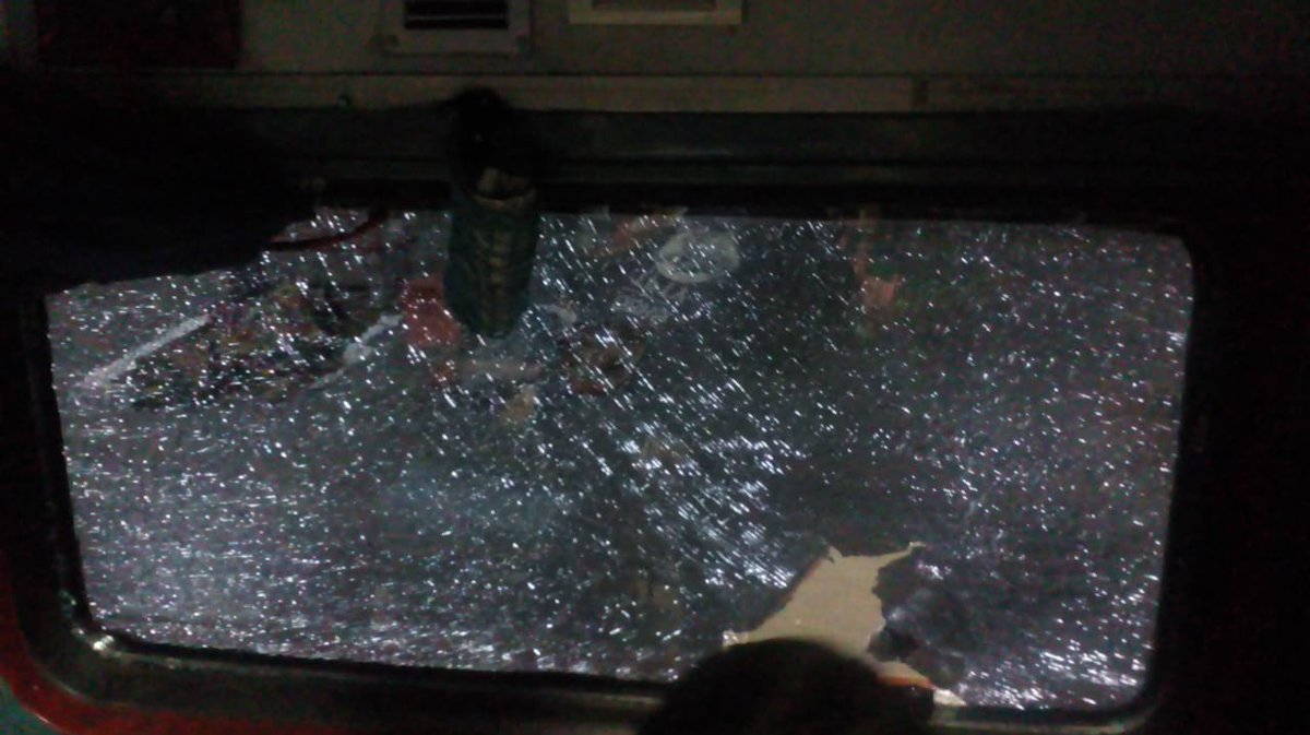 Uma09021971's tweet photo. Some one throw stone before raigadha station  in tirupati express in b2 coach . Train running in Glass broken status. do something to repair the same. https://t.co/5zwyZldeds