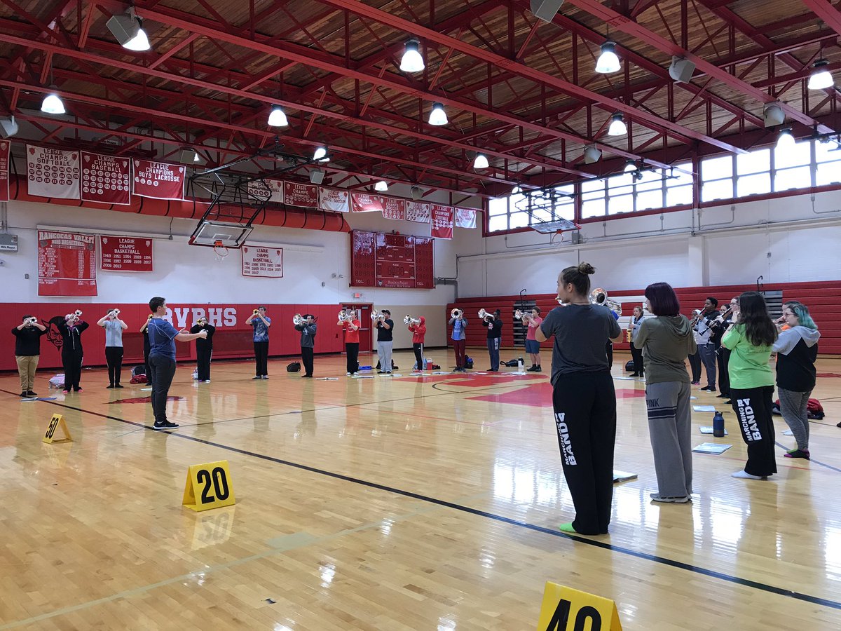 RvMarching's tweet photo. Making the best of a rainy rehearsal day! Tomorrow is State Championships at Rowan. RV performs at 3:15pm. https://t.co/Vep9L4krkH