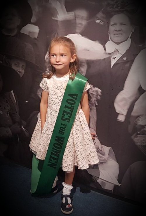kmackfitzgerald's tweet photo. I've submitted pictures to @PeoplesPicture of my grand aunt, suffragette Laura Geraldine Lennox, my gran, mom and three daughters. A legacy of incredible stong women. #FaceOfSuffrage #bannercaptain #womenssunday #hydepark https://t.co/yccKPE75DE
