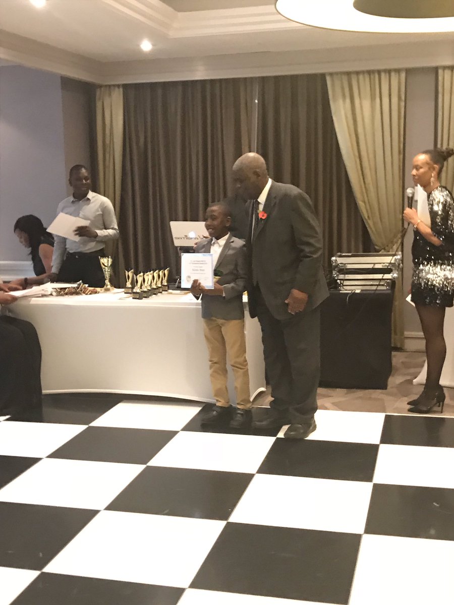EActonPrimary's tweet photo. A huge congratulations to Alzinho Peters, from @EActonPrimary for winning the Overall Outstanding Primary student award last night as part of The Dr John Roberts CBE QC 14th Annual Achievement Award Ceremony @descendants93 We are so proud of you! https://t.co/d42PBCJuQY