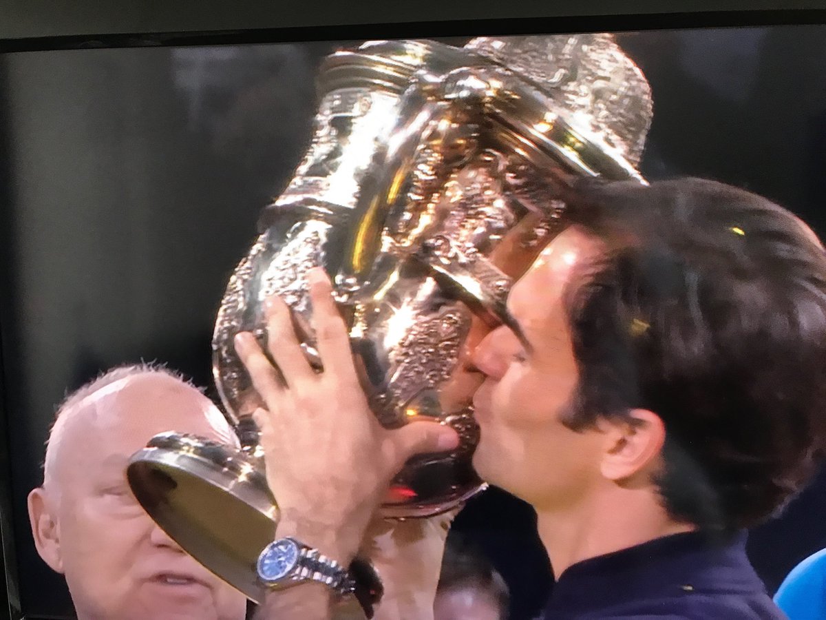 SharkoTennis's tweet photo. A familiar sight in Basel as ⁦@rogerfederer⁩ captures  his 9th #SwissIndoors crown and 99th career #ATP level title with a 76 64 win over #Copil. https://t.co/7iDWZidRzE