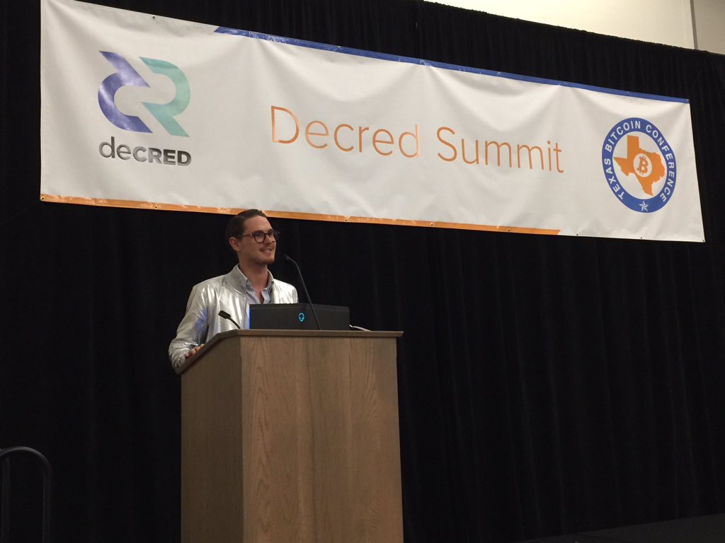 CryptoBAB's tweet photo. Great morning @TexasBitcoin conference. Strong start with @decredproject’s own @joshuam_ talking about the #decred economy and rocking the new #DecredJacket for 2019. Ask how you can win one before it’s available. #TexasBitcoinConference #TBC18 #dcrsummit https://t.co/XK4pMDerhZ