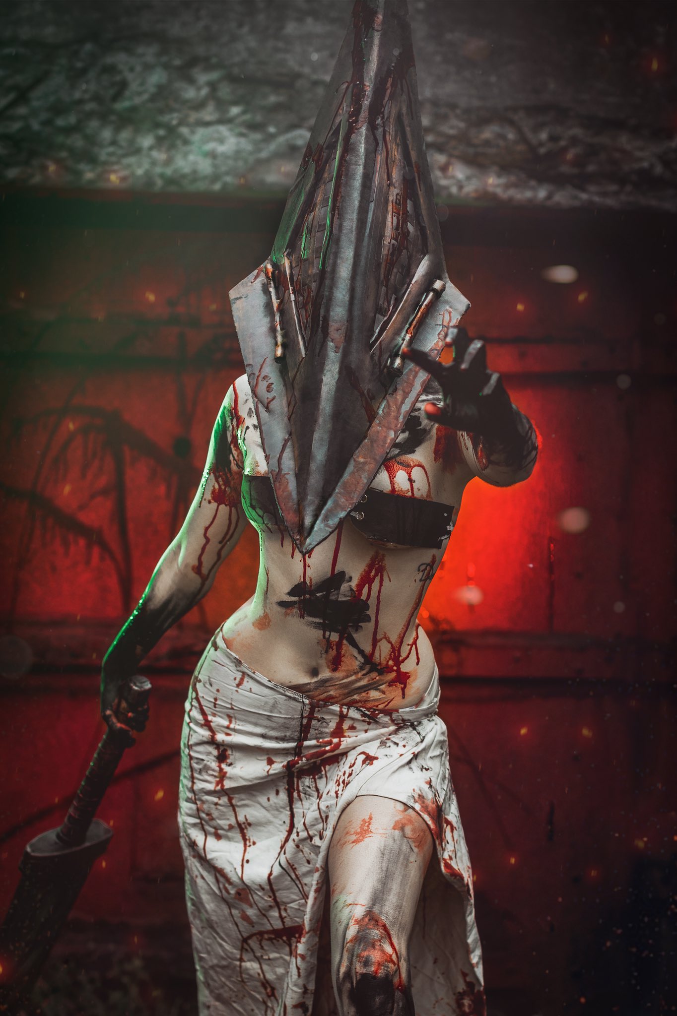 Hannah Riann, photographed on February 23, 2022, dresses as Silent Hill's Pyramid  Head Girl.