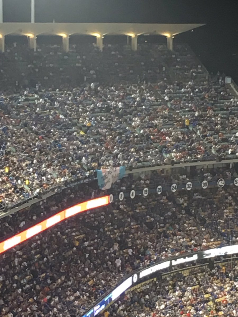 A giant Trans flag “Trans People Have The Right To Live” has be unveiled down the left field line. ✊🏻 Super impressive as signs are very hard to sneak into #Dodger Stadium. #TransRightsAreHumanRights #WorldSeries