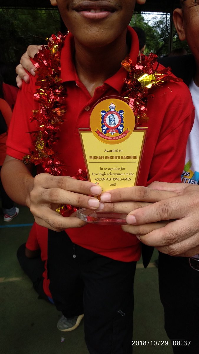 Flag Ceremony and Asian Games Autism Medal winners celebration at STI  - 2