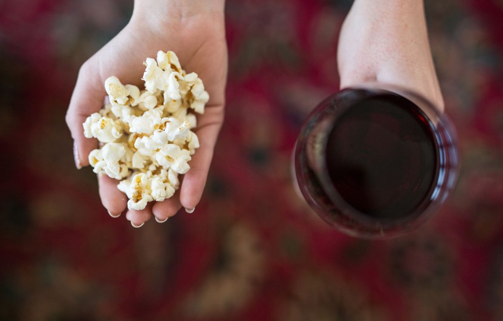 Is The Joy Of Missing Out The New Self-Care? Yes. In our opinion at least. Instead, stay at home sometimes, wear no makeup, wear your pjs, and indulge in some popcorn and Pinotage. It's literally good for you. #jomo