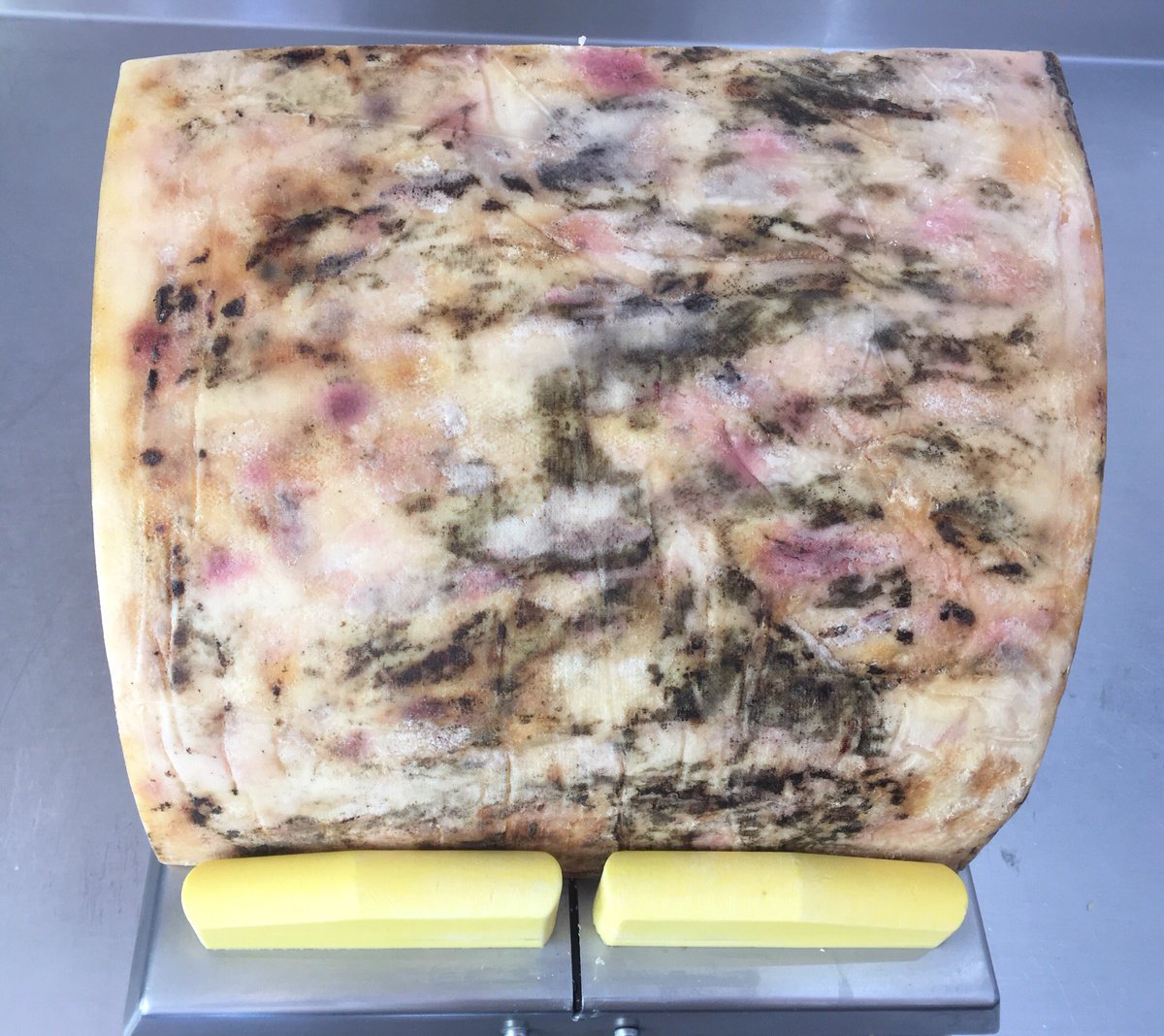 There are some awesome colours on this quarter of <a href="/Gouldscheddar/">Gould's Cheddar</a> that I’m about to cut into 👍🏻 #ILoveMyJob #Cheese #Pangbourne