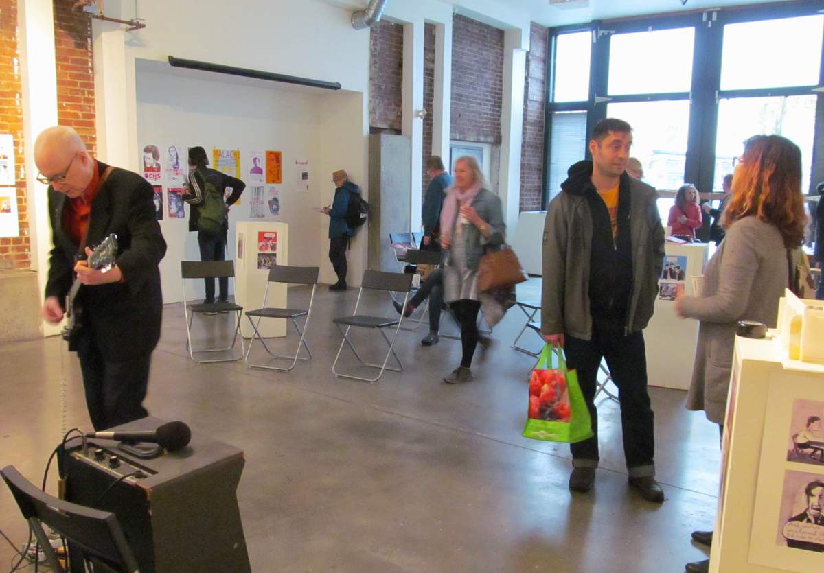 MeccaNormal's tweet photo. Incredible art and a great talk by #DavidLester @LesterMecca in Vancouver. Graphic novels, @MAGNETMagazine cartoons, Inspired Agitators poster series. I snuck my paintings in and Mecca Normal played! #labourhistory #socialjustice Graphic History Collective @GHC_Comics https://t.co/agfiR3HQsA